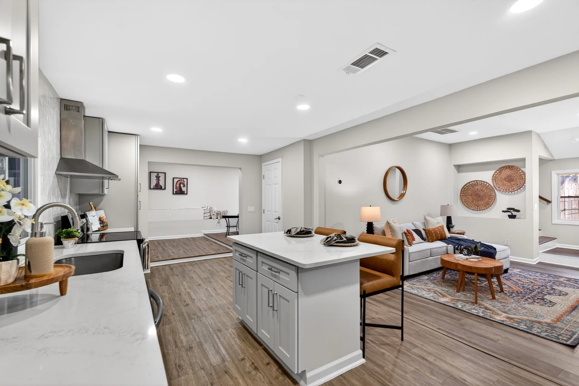 Staged kitchen open to the family room